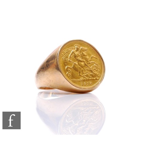 1 - A George V 1918 half sovereign inset signet ring, reverse George & Dragon, weight 12.5g.