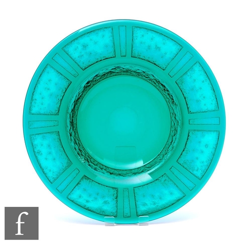 703 - An Art Deco Daum Nancy large glass dish, of shallow circular form, with deep acid etched panels to t... 