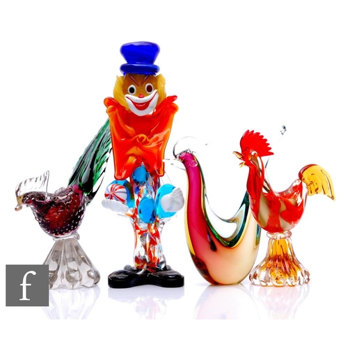 709 - A group of mid 20th Century Murano glass figures, to include a stylised clown, a sommerso stylised b... 