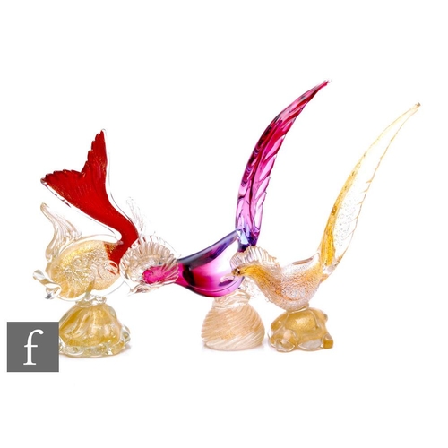 712 - Three mid 20th Century Murano glass figures, to include two stylised birds and a fish, all with vary... 