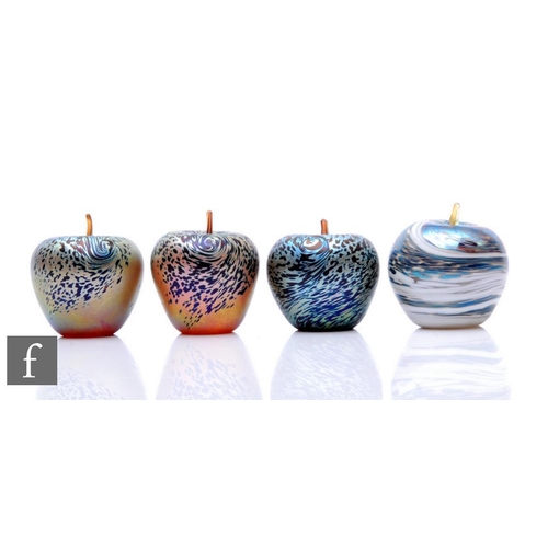 823 - A pair of contemporary Karina Sellars for Okra studio glass paperweights, modelled as an apple, deco... 