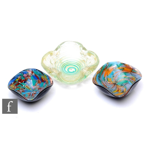 850 - A 20th Century Murano glass moulded glass dish, of quatrefoil form with internal blue spiral over go... 