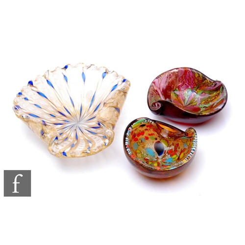 857 - A 20th Century Murano glass bowl, of shell form, decorated internally with alternating opal latticin... 