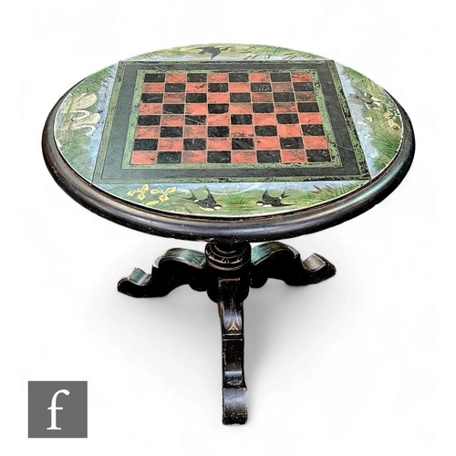 392A - A Victorian black slate games table, raised on wooden ebonised triform base, the circular black slat... 