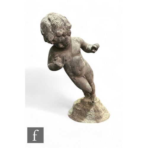 395 - A 19th Century lead garden figure of a young boy, on naturalistic base, height 59cm, damaged.