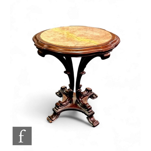 399 - A 20th Century Victorian style mahogany centre table, the pale pink marble top within a circular mou... 