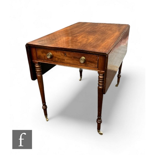 436 - A George III mahogany drop leaf table, raised on turned supports and terminating at brass castors, h... 