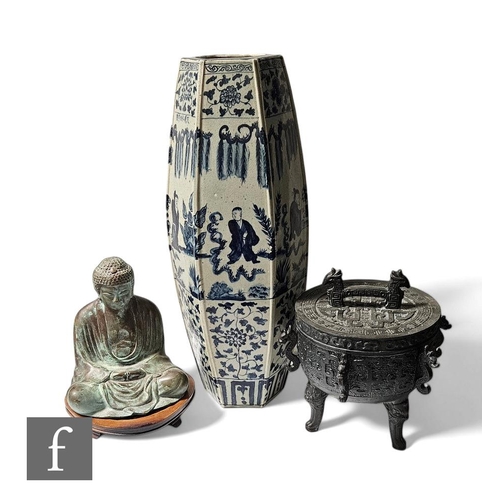 73 - A collection of 20th Century Chinese items, to include a seated cast metal buddha on wooden stand, h... 