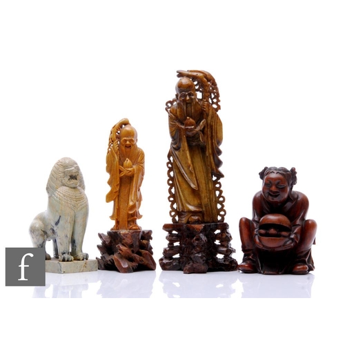 78 - A collection of Asian items to include two soapstone figures of Fukurokuju, heights 20cm and 26cm, a... 