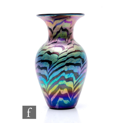 789 - A contemporary Lundberg studio glass vase of shouldered ovoid form with large flared rim, decorated ... 