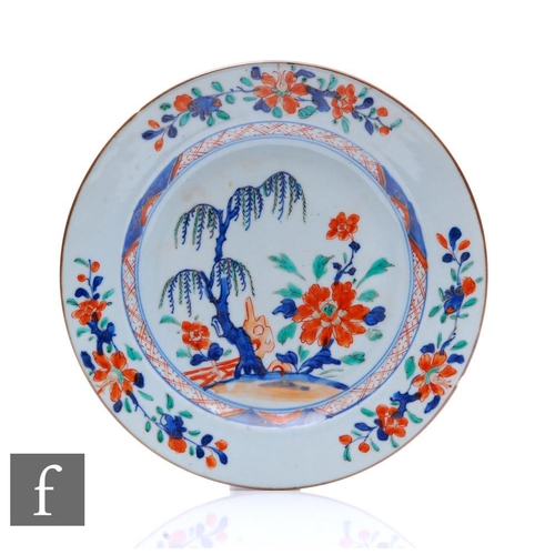 79 - An 18th Century Chinese export porcelain dish, decorated in the imari palette, with willow tree with... 