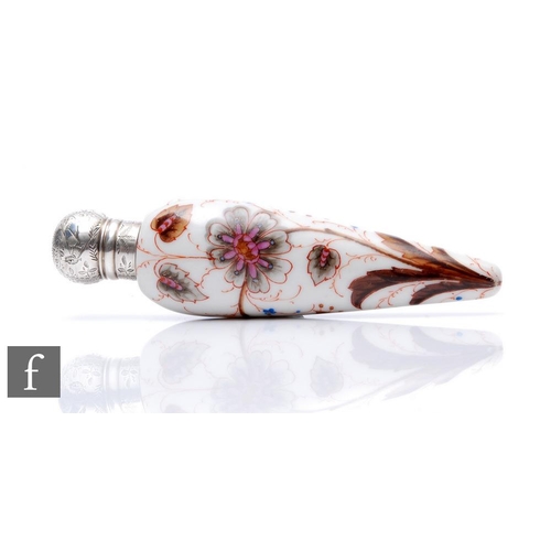 790 - An early 20th Century glass lay scent bottle of torpedo form, the opaque glass painted with flowers ... 