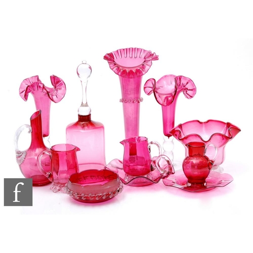 800 - A collection of late 19th to early 20th Century ruby or cranberry glass to include frill rim vases w... 