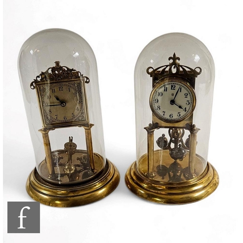 93 - A early 20th Century brass 365 day mantle clock, Arabic circular dial, in glass dome on stepped circ... 