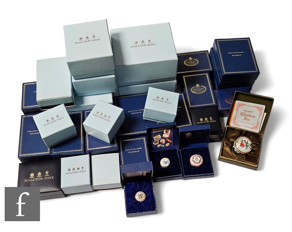 A large collection of boxed Halcyon Days enamel boxes, all boxed, to ...