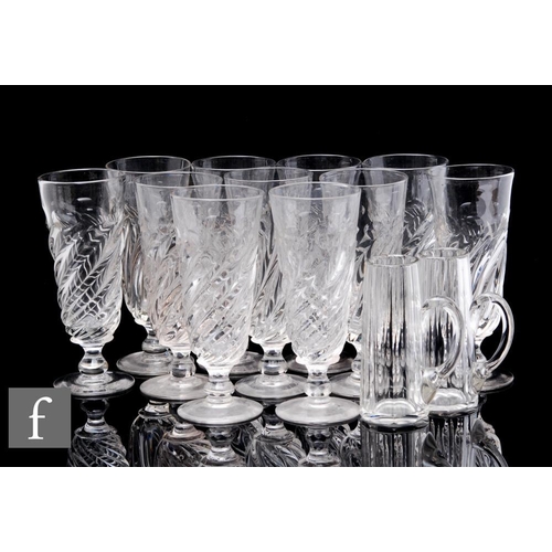 739 - A set of eleven 19th Century tavern or ale glasses, each with a tall wrythen fluted bowl with an upp... 