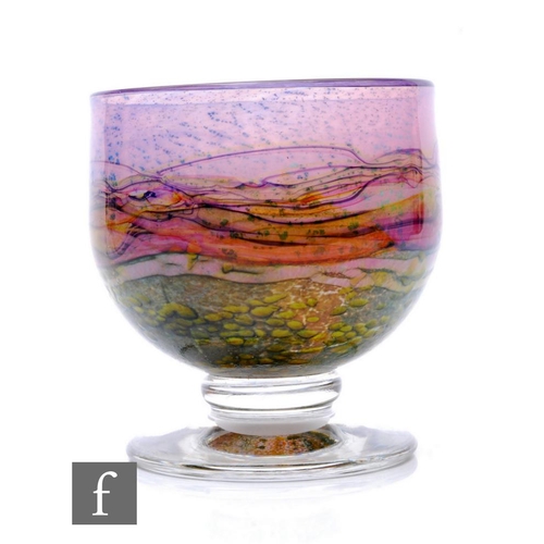 766 - A contemporary Jonathan Harris studio glass pedestal vase, in the Horizon pattern, the ovoid bowl de... 