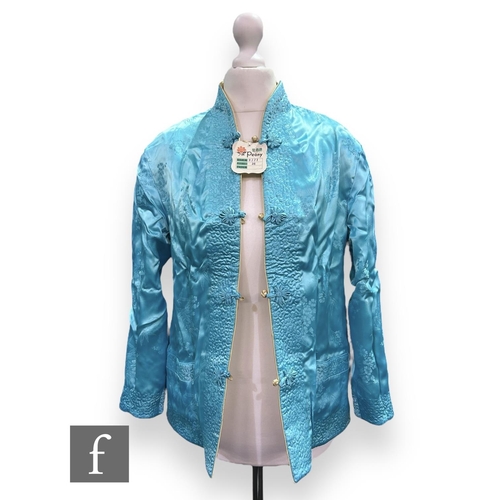 44 - A 1950s Peony Brand lady's Chinese style reversible jacket with floral sprays in pale yellow and blu... 