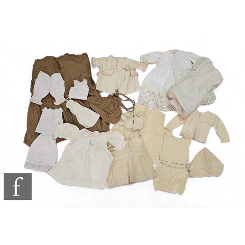 50 - An assorted collection of late 19th and early 20th Century children and dolls clothing, to include a... 