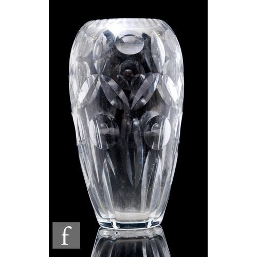 773 - A 1950s clear cut crystal glass vase by Waterford, the tall ovoid body with polished printie panels ... 