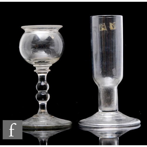 860 - An early 19th Century clear crystal glass oil lamp  of spherical form with a double inverted baluste... 