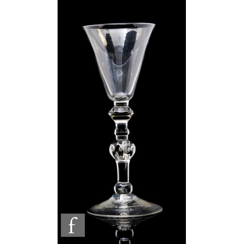 875 - A late 19th Century reproduction drinking glass in the 18th Century taste, the pointed round funnel ... 