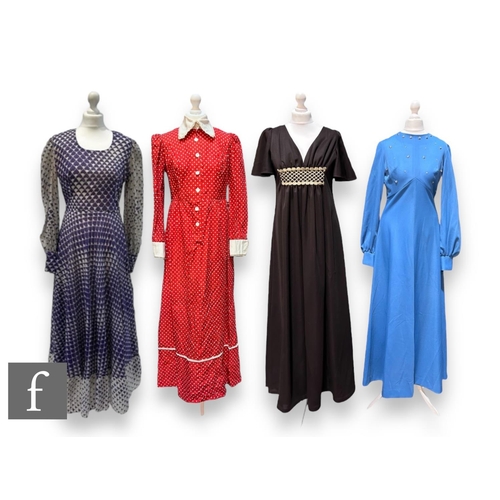 45 - Four 1970s vintage dresses, to include a purple and white geometric pattern with flared maxi skirt, ... 