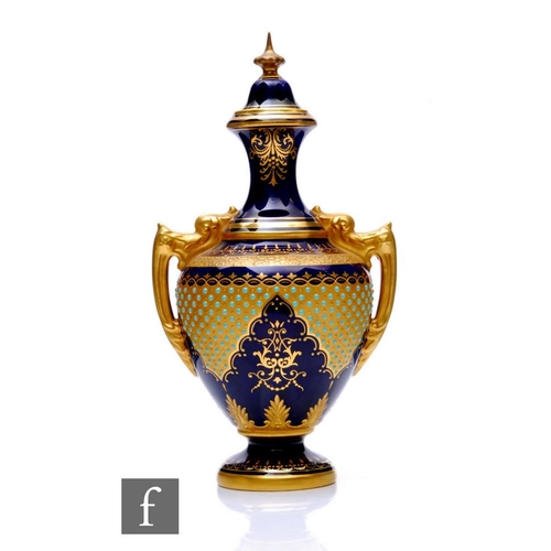 513 - A Coalport porcelain 'Jewelled' vase and cover, circa 1900, the spreading circular foot rising to tw... 