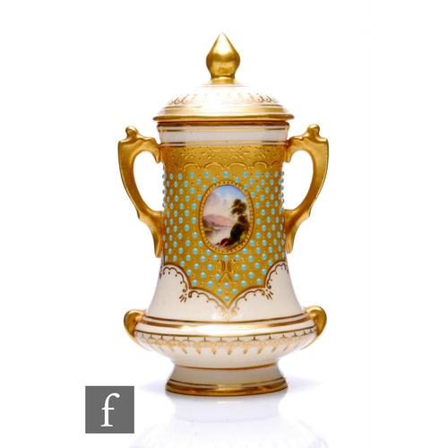 519 - A small Coalport porcelain vase and cover, circa 1900, of waisted form rising from a low pedestal fo... 