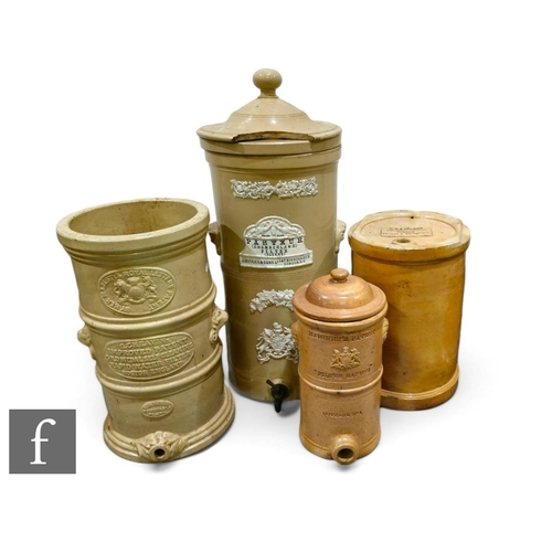 539 - A collection of various 19th Century stoneware spirit wine and water filters, to include a Gheavins ... 