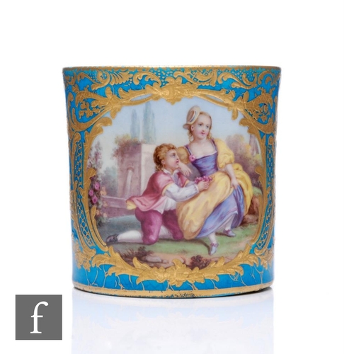 538 - A 19th Century Sevres coffee can of cylindrical form, the front cartouche painted with an embracing ... 