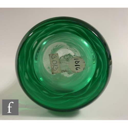 651 - A later 20th Century cameo glass vase of footed swollen sleeve form, cased in green over clear cryst... 