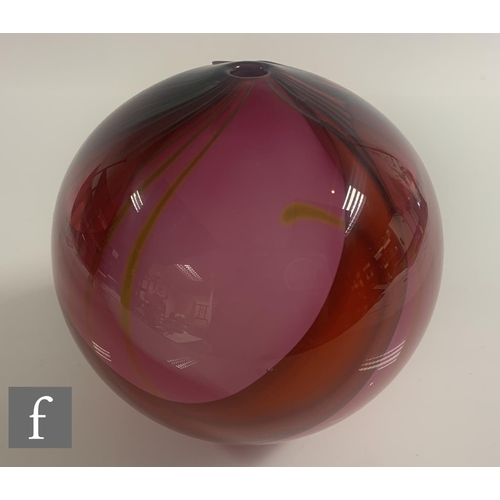 722 - A Peter Layton Pink Paradiso hand blown and cased body vase of spherical form with narrow circular a... 