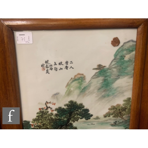 75 - A pair of Chinese late Qing Dynasty/Republic period framed porcelain plaques, each painted in famill... 