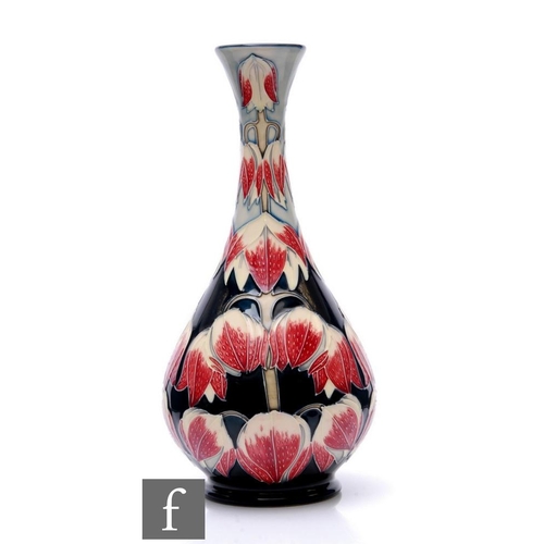 61 - A large Moorcroft Pottery bottle vase decorated in the Desert Ivory pattern designed by Anji Davenpo... 