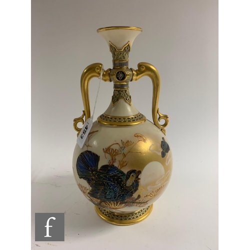 453 - A Royal Worcester twin handled Persian style vase, dated 1883, by Charles Baldwyn, painted with bird... 