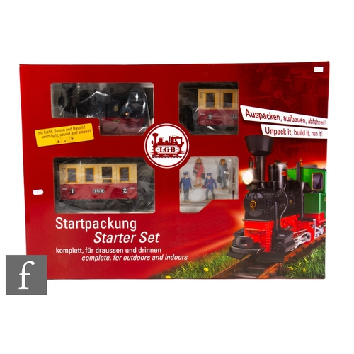 15 - A G gauge LGB 78302 Passenger Starter Set with 0-4-0T LGB 2 locomotive, two passenger coaches and ac... 