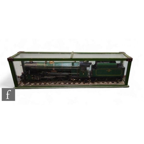 25 - A 2 1/4 inch gauge live steam 2-6-2 locomotive and a later tender named Oliver Cromwell, British Rai... 