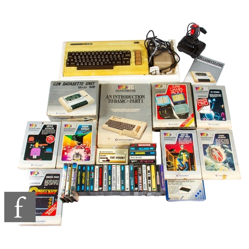 408 - A Commodore VIC-20 with cassette unit and a quantity of games.