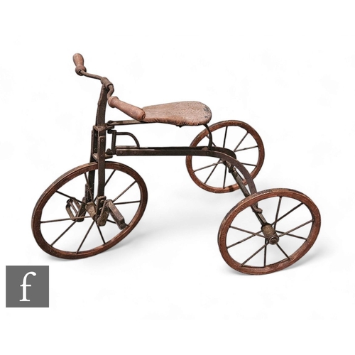 414 - A late 20th Century Victorian style child's tricycle, spoked wheels with turned wooden handle bar an... 