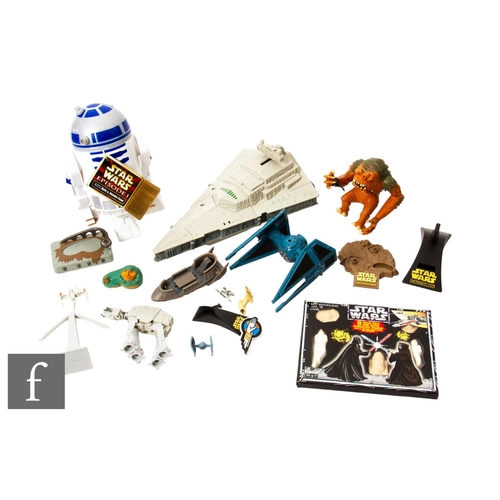 452 - A collection of Star Wars related merchandise, to include various toys, cinema standees, various emp... 