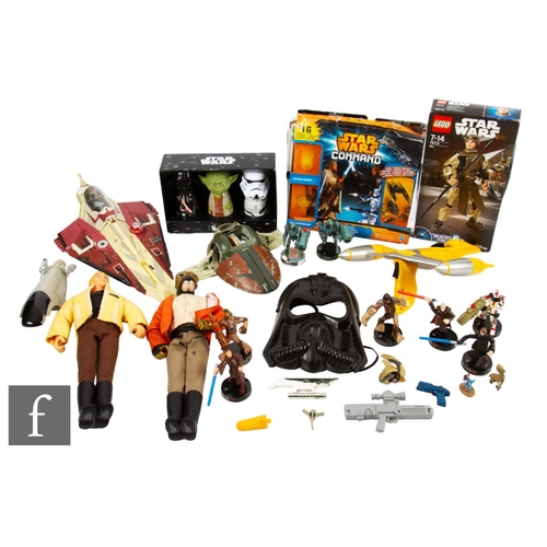 454 - A collection of Star Wars related toys and lego, to include boxed buildable figures, various action ... 