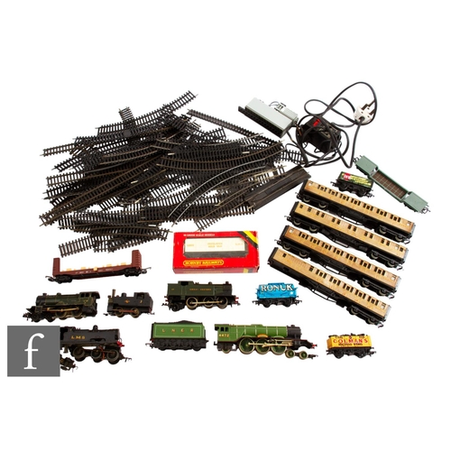 23 - A collection of OO gauge model railway items to include five locomotives by Hornby, Trix and similar... 