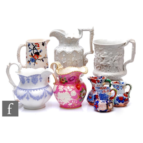 487 - A collection of 19th Century to early 20th Century jugs, to include two Charles Meigh stoneware jugs... 