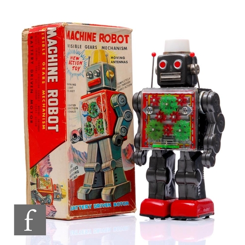 34 - A 1960s Japanese Horikawa Machine Robot, battery operated tinplate toy in grey with red feet, clear ... 