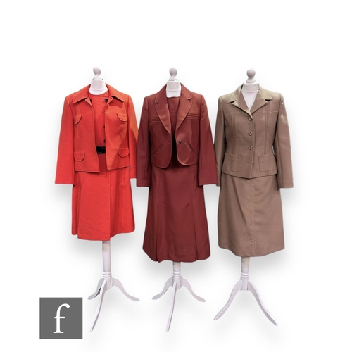 32 - Three 1960s vintage two piece suits, comprising Hucke Model dress and jacket in red with black butto... 