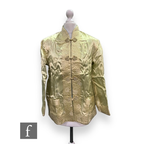 44 - A 1950s Peony Brand lady's Chinese style reversible jacket with floral sprays in pale yellow and blu... 