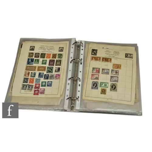 144 - An early 20th Century stamp album containing countries of the world, also Commonwealth, definitive a... 