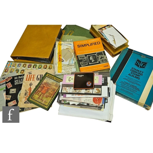 146 - An album of presentation packs, various loose packs, assorted loose stamps and an album of postcards... 