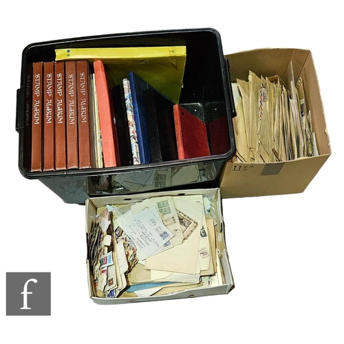 124 - An extensive collection of British and world stamps contained in various albums and stock books, loo... 